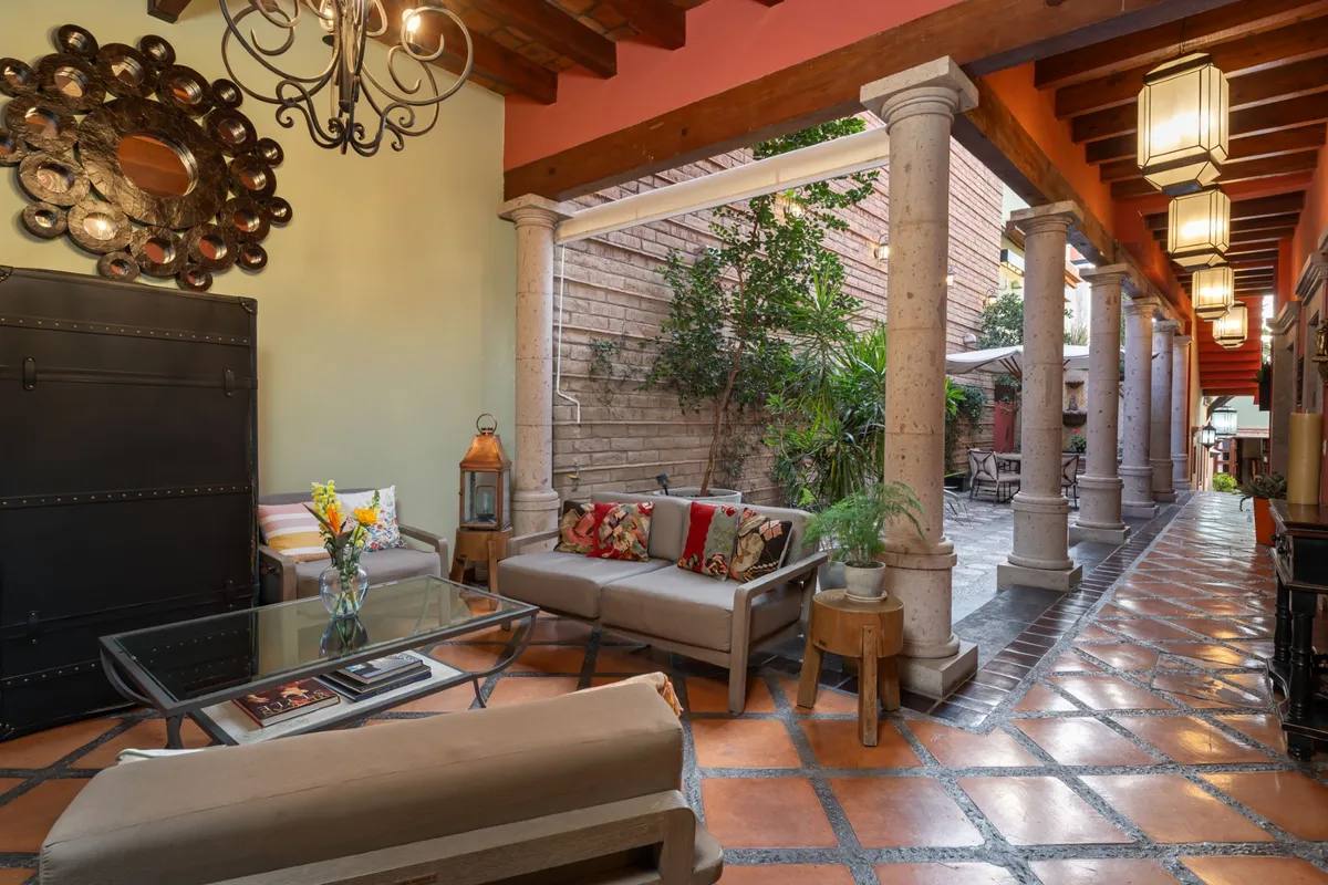 Courtyard living room beside the kitchen with terracotta tile floor